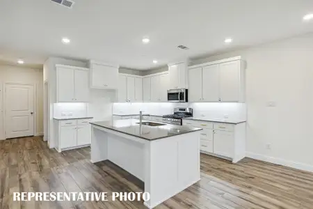 No shortage of space or style in this dream kitchen!  REPRESENTATIVE PHOTO