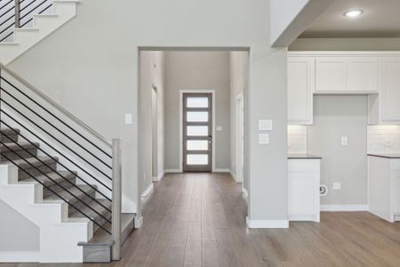 Entryway in the Henley home plan by Trophy Signature Homes – REPRESENTATIVE PHOTO