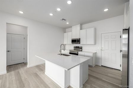 New construction Condo house 6153 N Ceylon St, Unit 108, Denver, CO 80249 plan Vyktorea II-G - image 4