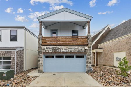 Front of property featuring a garage