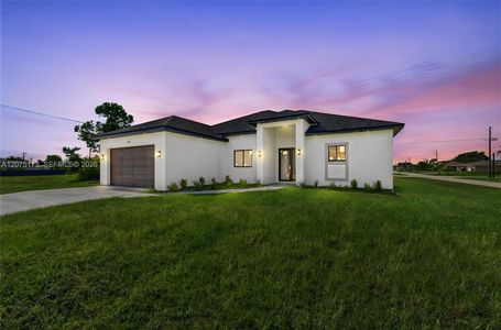 New construction Single-Family house 1728 Kismet Pkwy W, Cape Coral, FL 33993 - image