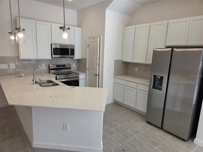 New construction Townhouse house 10556 Ebb Tide Ln, Orlando, FL 32821 - image 17