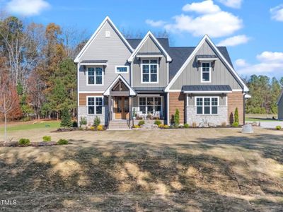 New construction Single-Family house 145 Wiggins Road, Louisburg, NC 27549 - photo 0