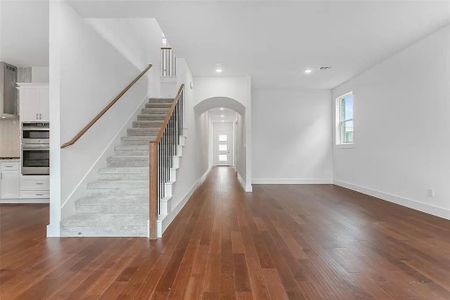 Entryway featuring dark wood-type flooring