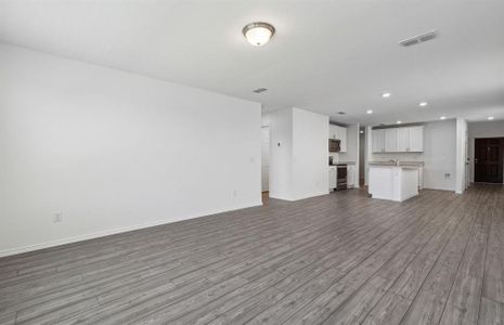 Airy gathering room with large windows *real home pictured