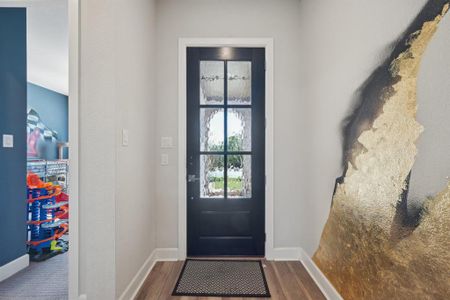 Entryway featuring hardwood / wood-style floors