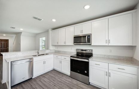 Spacious kitchen with ample cabinet space*real home pictured