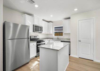 A chef-ready kitchen with a long island.