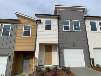 New construction Townhouse house 1688 Gunnin Trce Nw, Atlanta, GA 30318 Indigo- photo 0