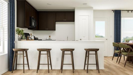 Kitchen with a kitchen breakfast bar, dark brown cabinets, sink, and light hardwood / wood-style flooring