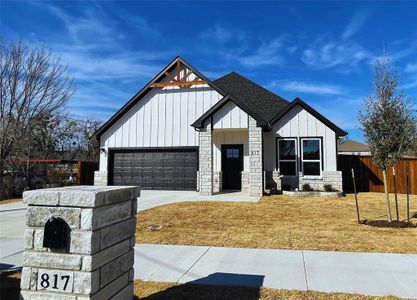 Modern featuring a garage