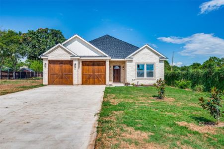 View of front of house with a front yard