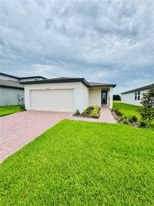 New construction Single-Family house 2505 Merseyside Ct, Haines City, FL 33844 Acadia- photo 0