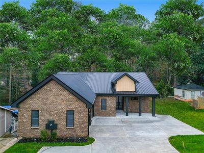 New construction Single-Family house 717 Caribbean Drive, Forest Park, GA 30297 - photo 0