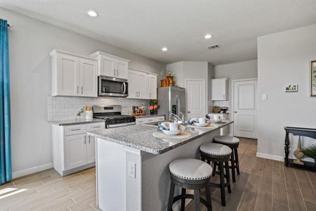 Kitchen - All Home and community information, including pricing, included features, terms, availability and amenities, are subject to change at any time without notice or obligation. All Drawings, pictures, photographs, video, square footages, floor plans, elevations, features, colors and sizes are approximate for illustration purposes only and will vary from the homes as built.