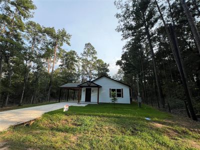 New construction Single-Family house 7954 Hawthorne Lane, Plantersville, TX 77363 - photo 0