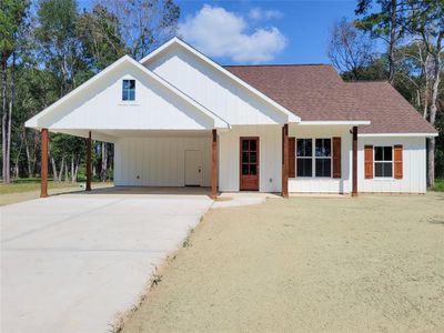 New construction Single-Family house 1116 County Road 2235, Cleveland, TX 77327 - photo 0