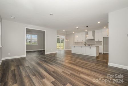 Now this is "Open Concept." Note the beautiful Luxury Vinyl Plank floors. (Representative Photo)