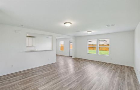 Airy gathering room with large windows*real home pictured