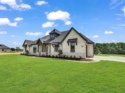 New construction Single-Family house 313 Wrangler Ct, Weatherford, TX 76088 - image