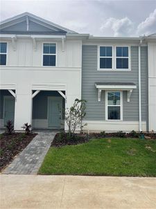 New construction Townhouse house 1269 Blue Island Drive, Clermont, FL 34714 - photo 0