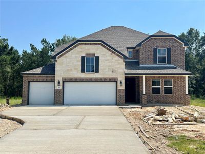 New construction Single-Family house 981 County Road 2269, Cleveland, TX 77327 Omaha- photo 0