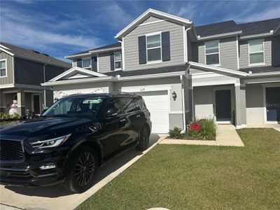 New construction Townhouse house 619 Stoney Point Cir, Davenport, FL 33896 - photo 0