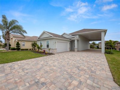 New construction Single-Family house 715 Teaberry Trl, Polk City, FL 33868 - photo 0