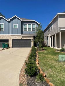 New construction Townhouse house 613 Royal Arch Drive, Conroe, TX 77304 - photo 0