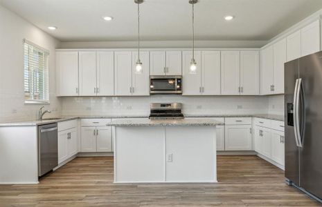 Oversized kitchen with ample cabinet space *real home pictured