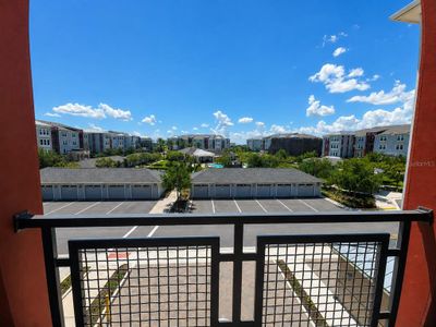 New construction Condo house 7545 Laureate Blvd, Unit 7301, Orlando, FL 32827 plan Aspen with Study - image