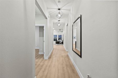 Hallway featuring light hardwood / wood-style flooring