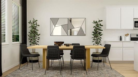 Dining space featuring light wood-type flooring