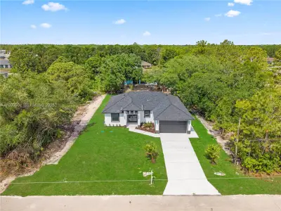 New construction Single-Family house 3701 Ida Ave N, Lehigh Acres, FL 33971 - image