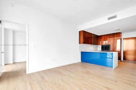 OPEN KITCHEN TO LIVING AREA