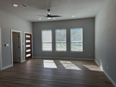 Experience the epitome of modern living in this stunning kitchen, showcasing a luxurious quartz countertop, exquisite cabinetry, abundant storage, a generous pantry, and state-of-the-art appliances. This space is not just beautiful; it's designed for both functionality and style, making it the heart of your home!