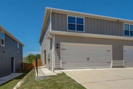 View of front of home featuring a garage