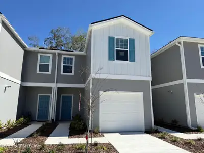 New construction Townhouse house 13533 Ute Pl, Jacksonville, FL 32218 Woodford- photo 1 1