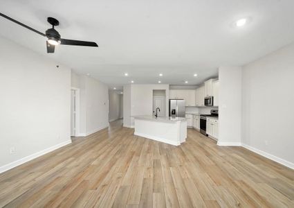 The adjoining kitchen and family room.