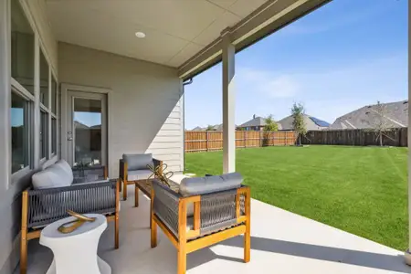 Covered Patio in the Diamond home plan by Trophy Signature Homes