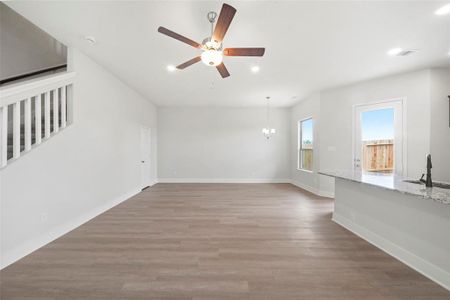 Family with high ceilings and large windows