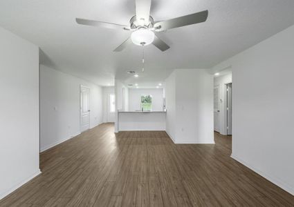 The long foyer leads to the family room.