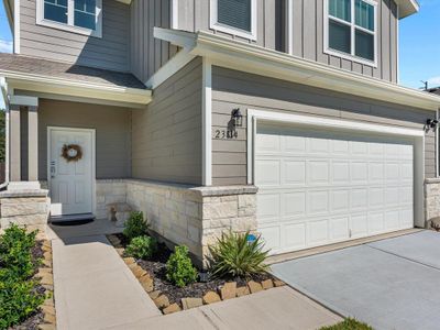 Charming front entry with a 2-car elevation