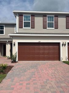 New construction Townhouse house 1184 Woody Cypress Drive, Kissimmee, FL 34746 Powell- photo 0