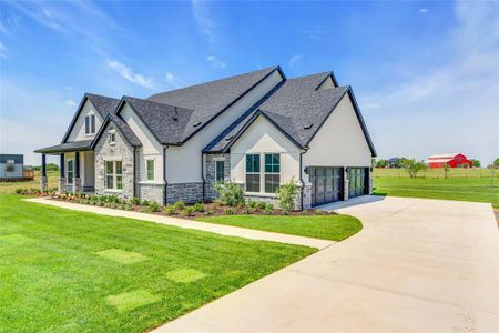 View of front of house featuring a front lawn