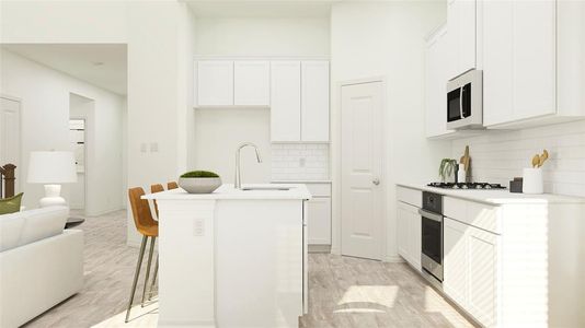 Kitchen featuring a center island with sink, light hardwood / wood-style floors, appliances with stainless steel finishes, and sink