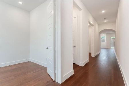 Hall featuring dark hardwood / wood-style flooring