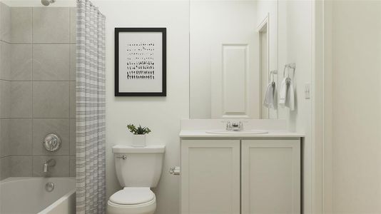 Full bathroom featuring vanity, toilet, and shower / bath combination with curtain