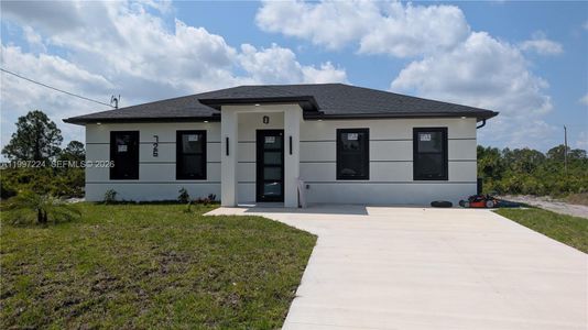 New construction Single-Family house 726 Clancy St E, Lehigh Acres, FL 33974 - image