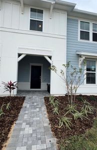 New construction Townhouse house 1267 Blue Paradise Way, Clermont, FL 34714 - photo 0